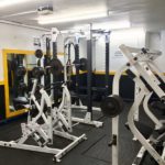 Inside Squats Gym: Power cage, row machine and behind neck press